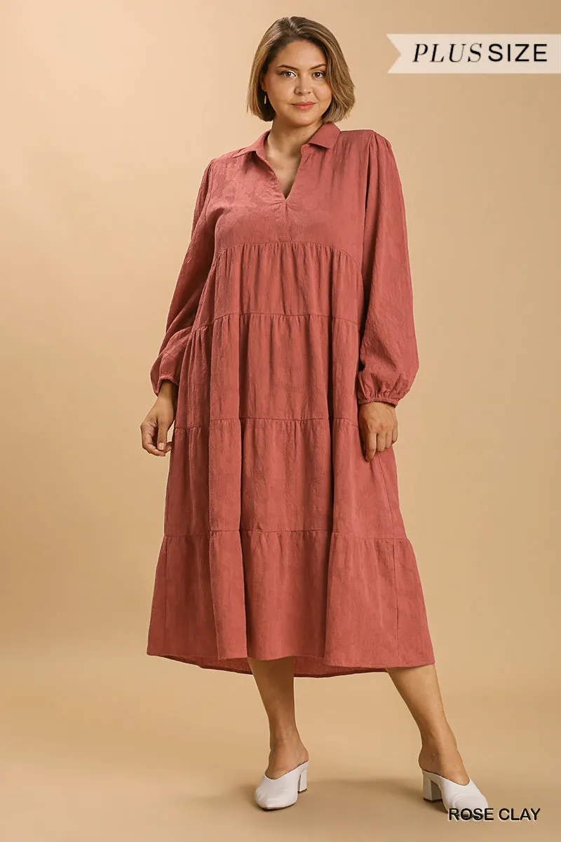 Sure! Heres an optimized title for your e-commerce product:

Stylish Textured Long Sleeve Plus Size Maxi Dress with Split Neck and Tiered Design - Ships from the USA