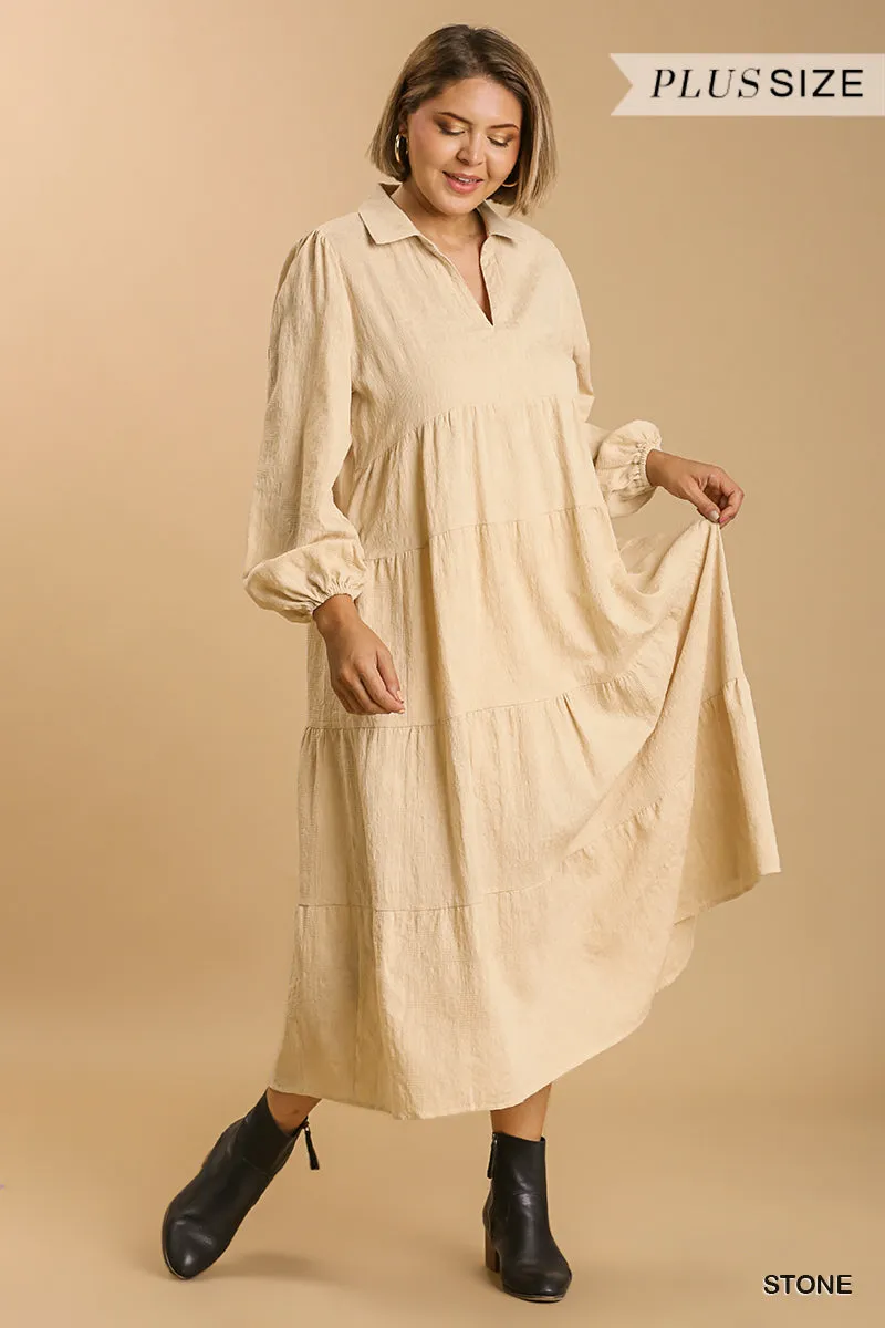 Sure! Heres an optimized title for your e-commerce product:

Stylish Textured Long Sleeve Plus Size Maxi Dress with Split Neck and Tiered Design - Ships from the USA